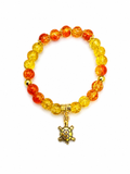 Yellow & Burnt Orange Glass Bead Bracelet with Turtle Charm