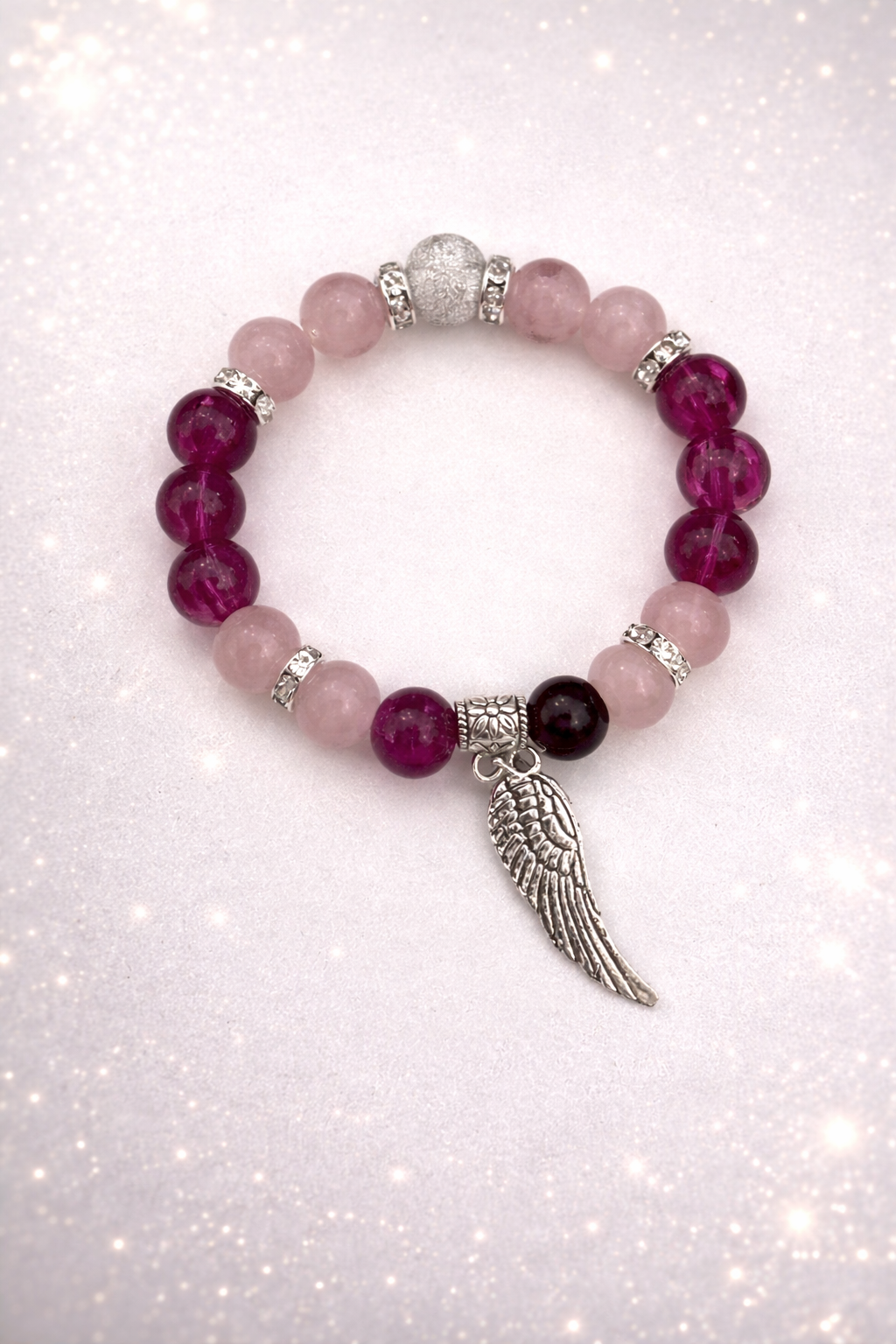 8mm Glass Bead Bracelet with Silver Wing Charm